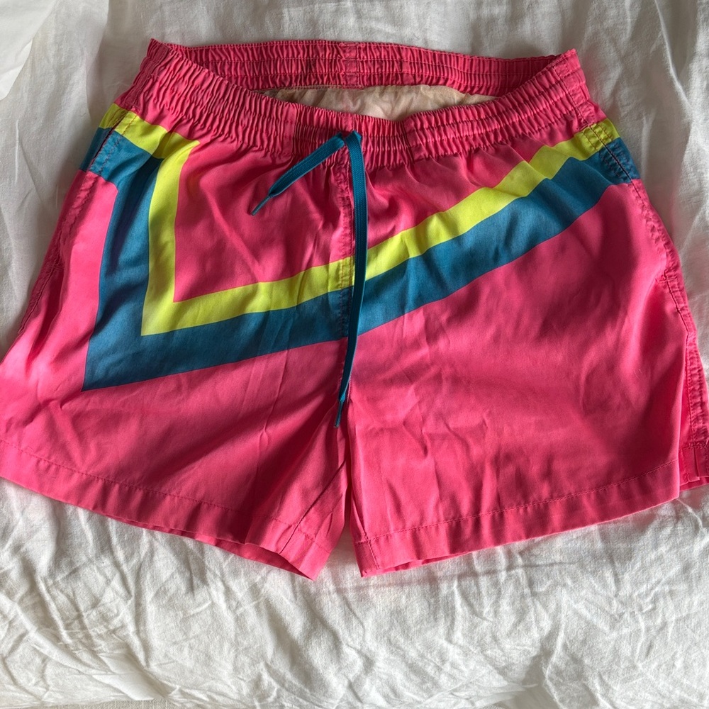 Chubbies Pink Swim Trunks with Blue and Yellow Accents